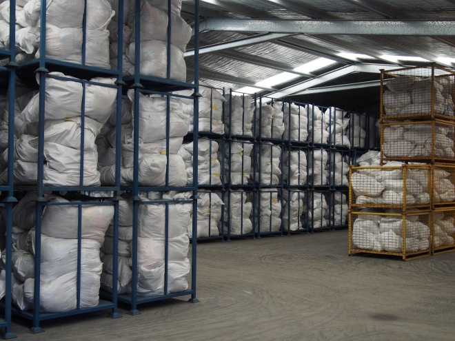 Bags of unsorted items in storage at the Vinnies Mitchell Distribution Centre
