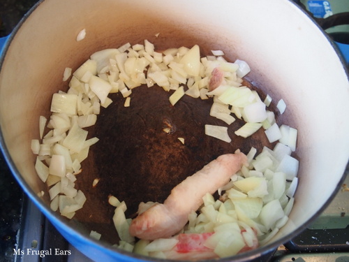 Frying the onions in lamb fat