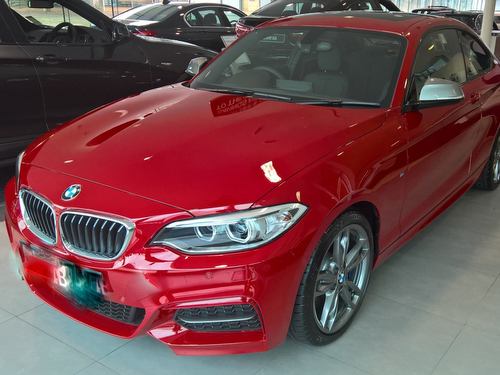 A red BMW sports car