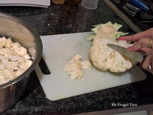 My housemate cuts her cauliflower into florets
