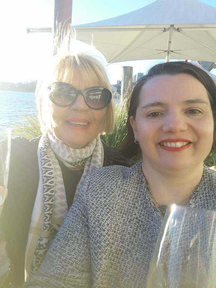 Mother and daughter - sharing a glass of sparkly on arrival in Sydney